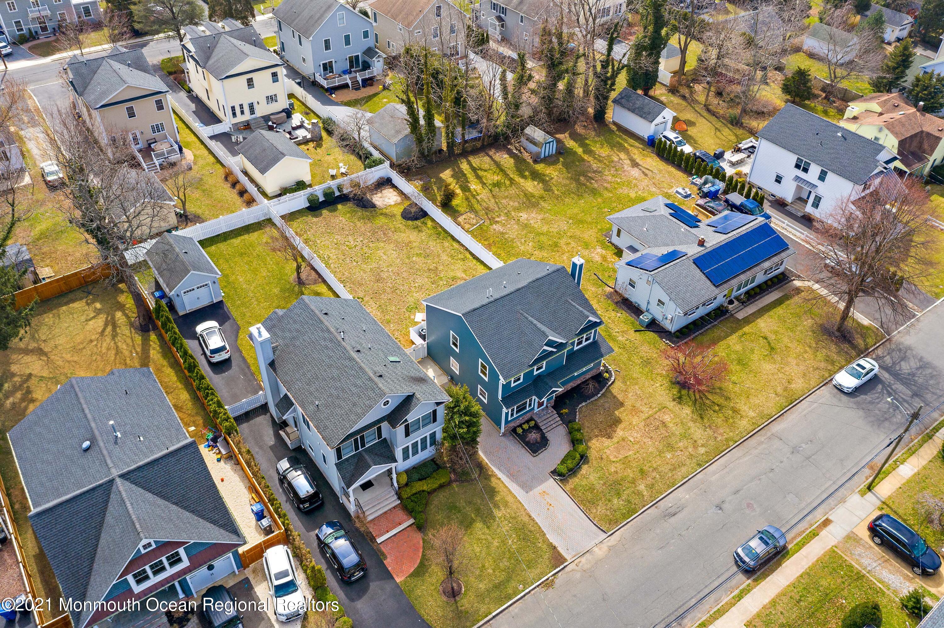 94 Jackson Street Fair Haven, NJ 07704 - Photo 75 of 83 an aerial view of residential houses with outdoor space