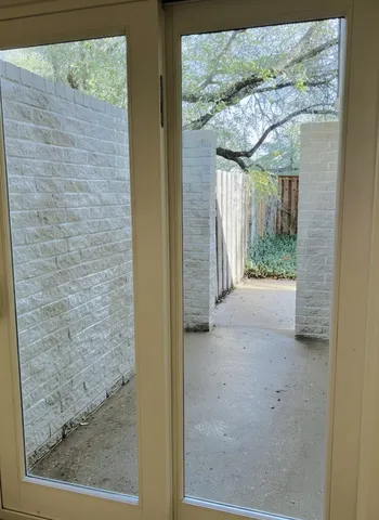 a backyard of a house with lots of green space