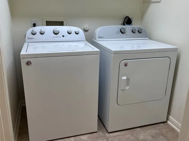 a building with trees in the background