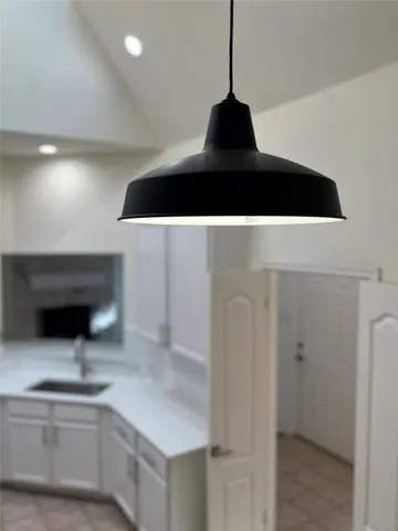 a kitchen with a stove and a microwave