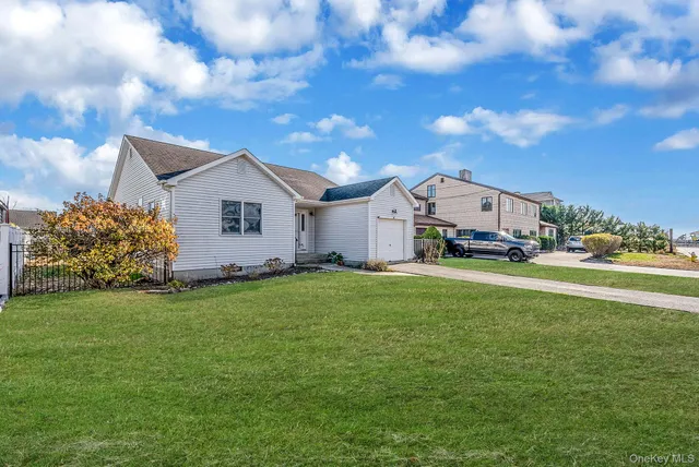 a view of a house with a back yard