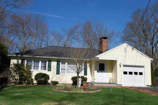 10 Key Rock Road Newtown, CT 06470 - Photo 1 of 1 a front view of a house with a garden and plants