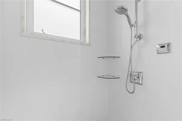 a bathroom with a bath tub