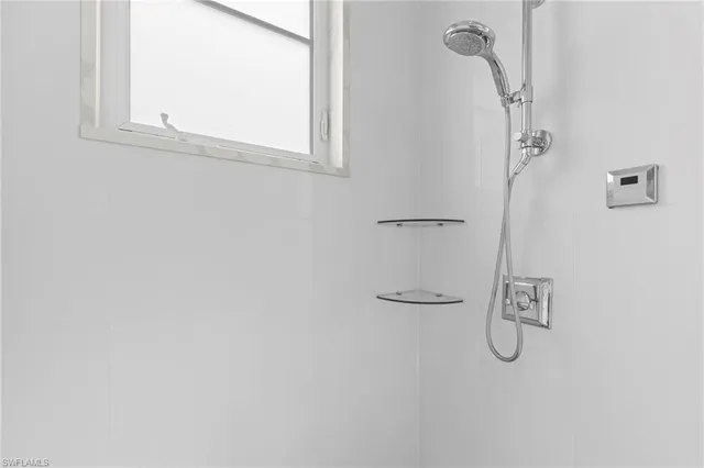 a bathroom with a bath tub