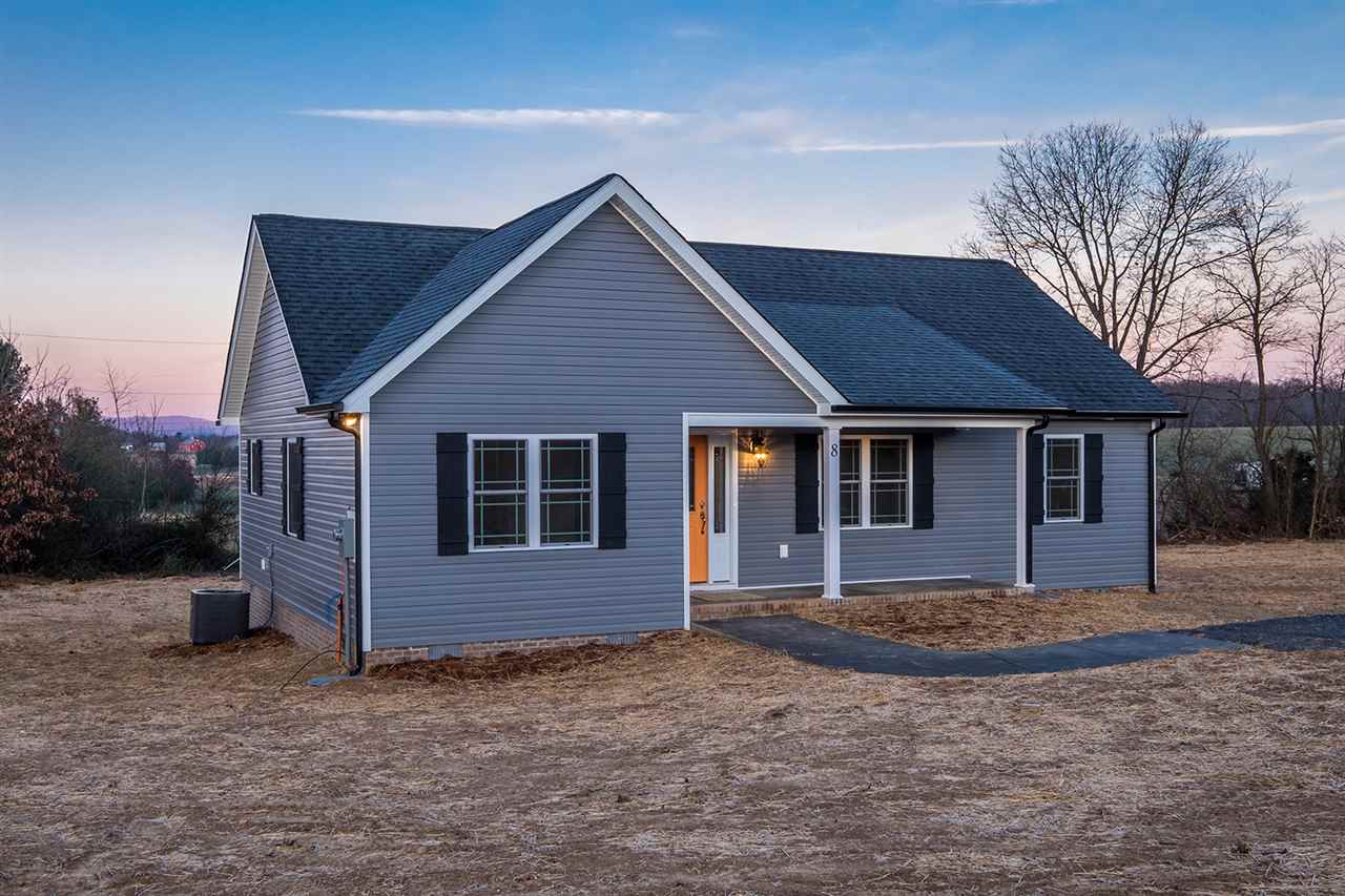 a front view of a house with a garage