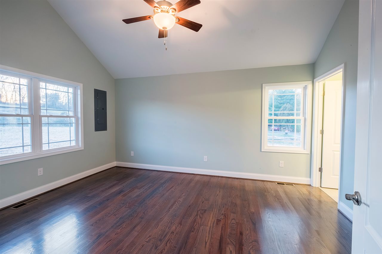 8 North Point School Road Waynesboro, VA 22980 - Photo 16 of 40 a view of an empty room with wooden floor and a window