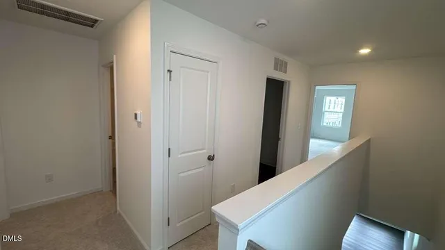 a view of hallway with stairs