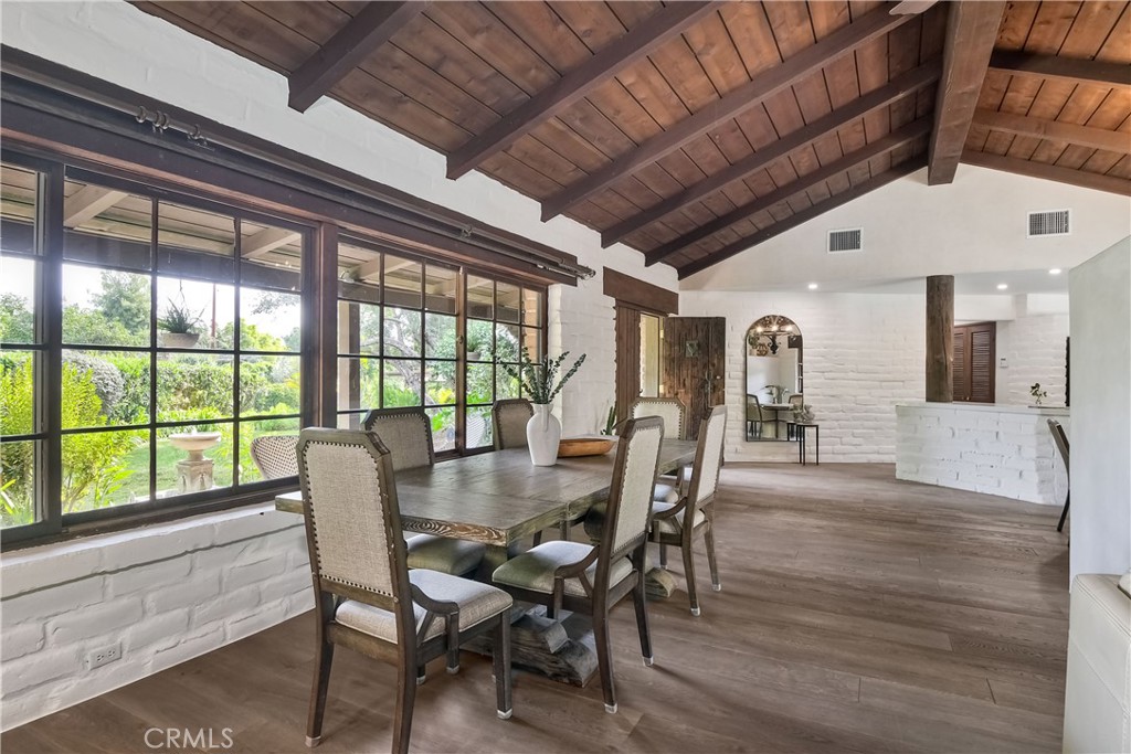 762 Hamilton Lane Fallbrook, CA 92028 - Photo 13 of 39 a view of a dining room with furniture window and wooden floor