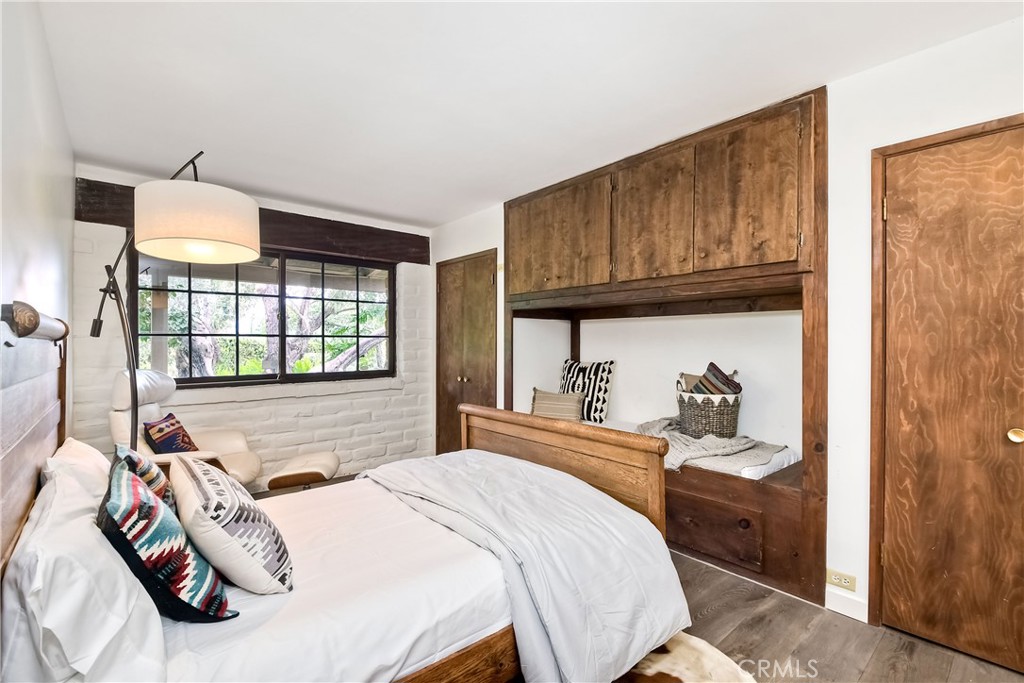 762 Hamilton Lane Fallbrook, CA 92028 - Photo 18 of 39 a bedroom with a bed and a dresser