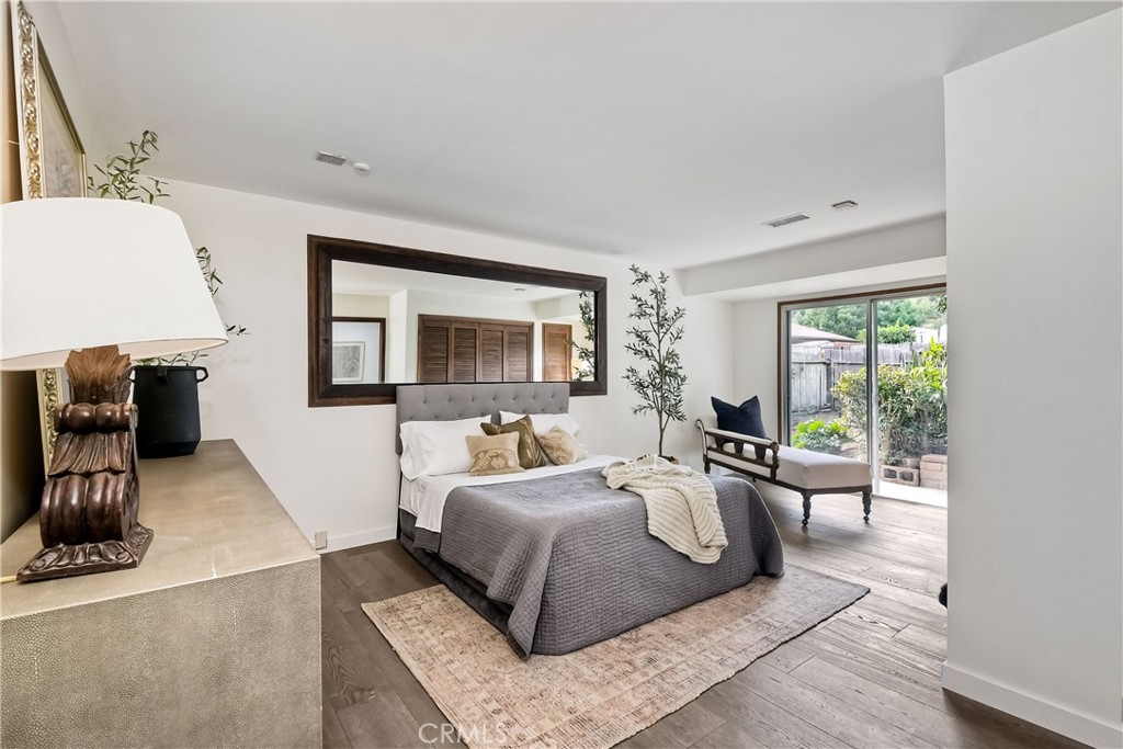 762 Hamilton Lane Fallbrook, CA 92028 - Photo 19 of 39 a bedroom with a large bed and a window