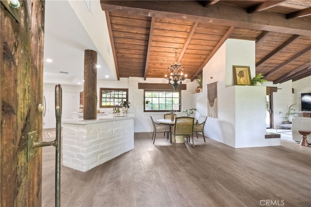 762 Hamilton Lane Fallbrook, CA 92028 - Photo 2 of 39 a view of living room kitchen with furniture and large window