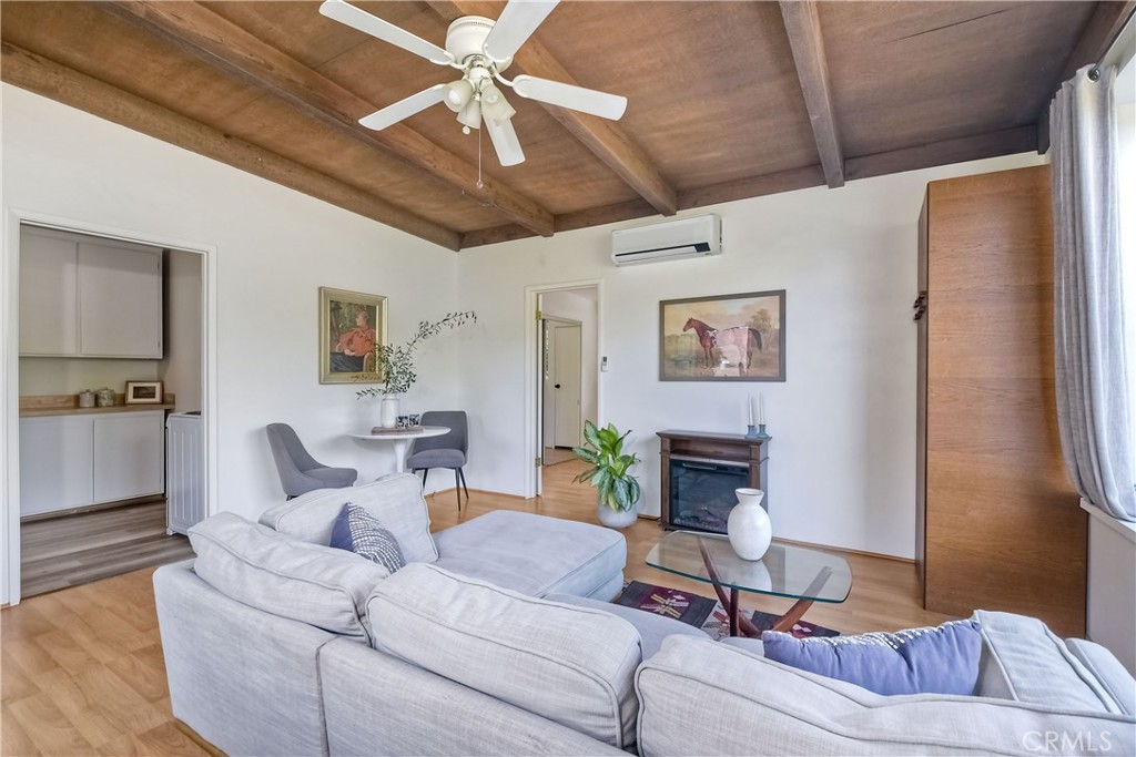 762 Hamilton Lane Fallbrook, CA 92028 - Photo 26 of 39 a living room with furniture and a fireplace