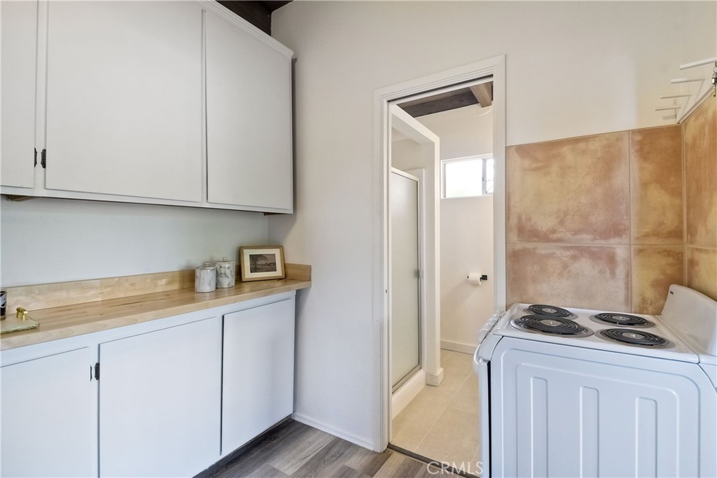 762 Hamilton Lane Fallbrook, CA 92028 - Photo 28 of 39 a kitchen with stainless steel appliances granite countertop a sink and a stove with white countertops