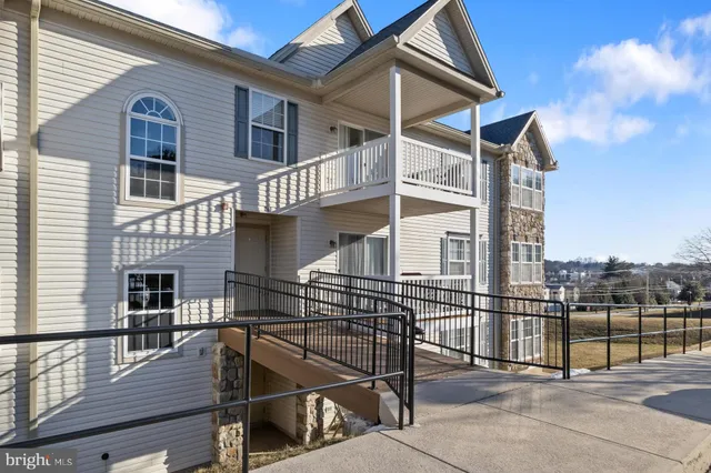 a view of house with outdoor seating space
