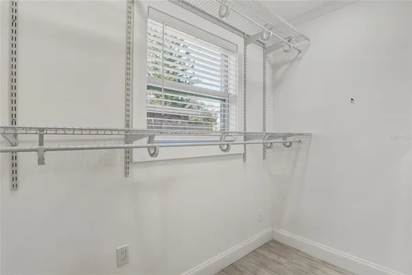 a view of a room with racks on the wall
