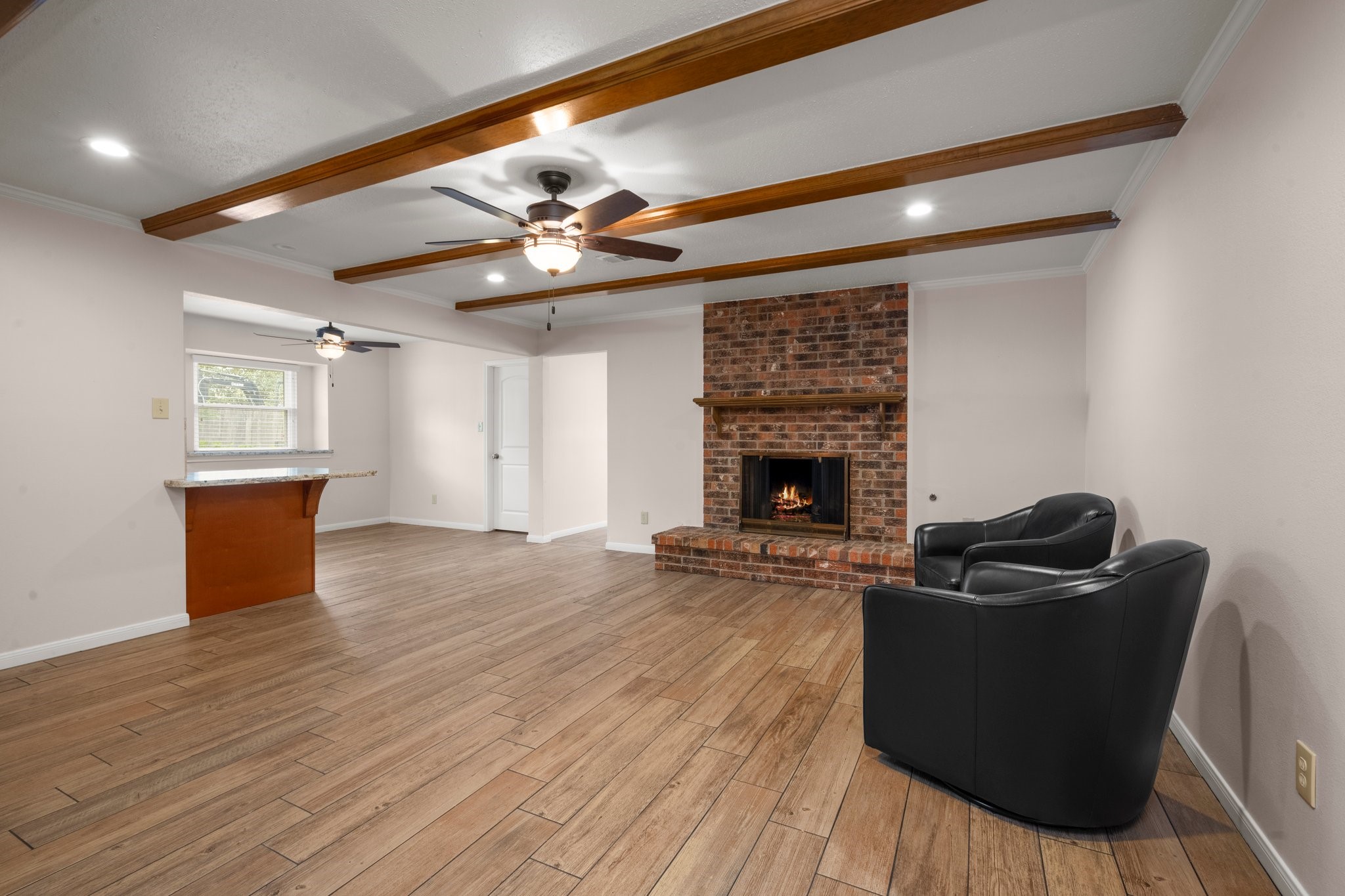 1206 Lynwood Road Spring, TX 77373 - Photo 11 of 29 a living room with furniture and a fireplace