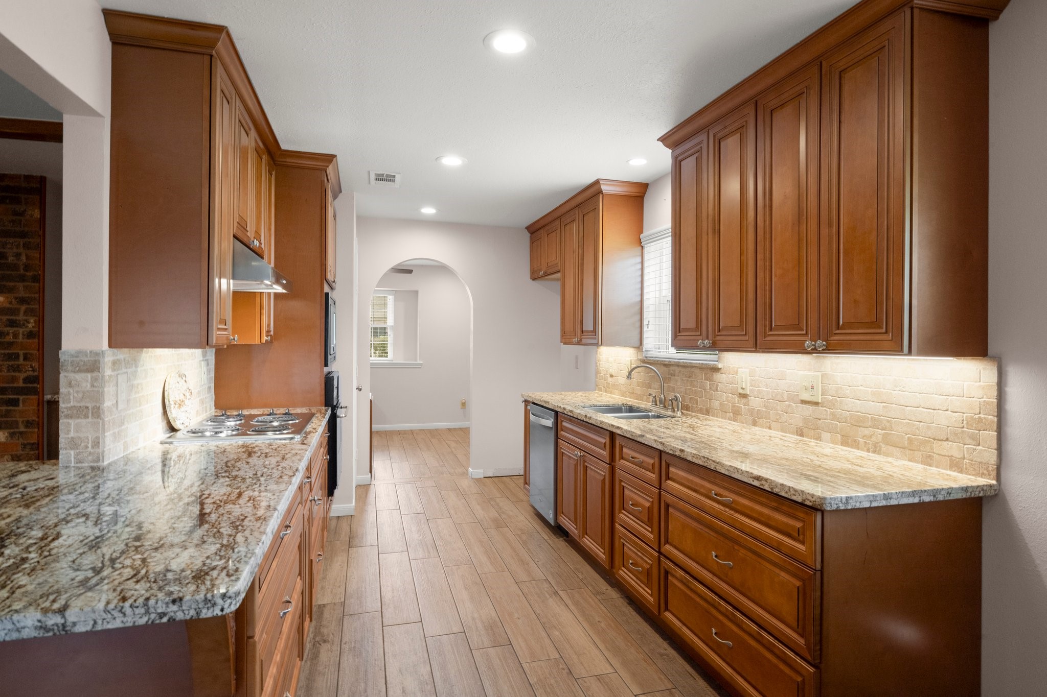 1206 Lynwood Road Spring, TX 77373 - Photo 13 of 29 a bathroom with a granite countertop sink and a granite top