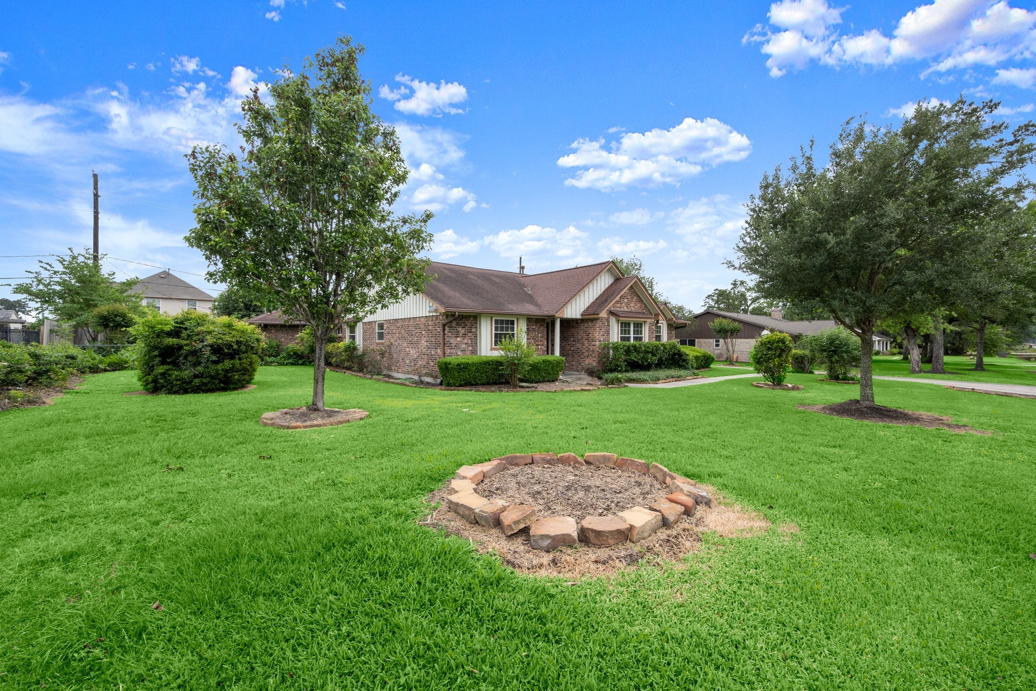 1206 Lynwood Road Spring, TX 77373 - Photo 2 of 29 a view of an house with backyard space and garden
