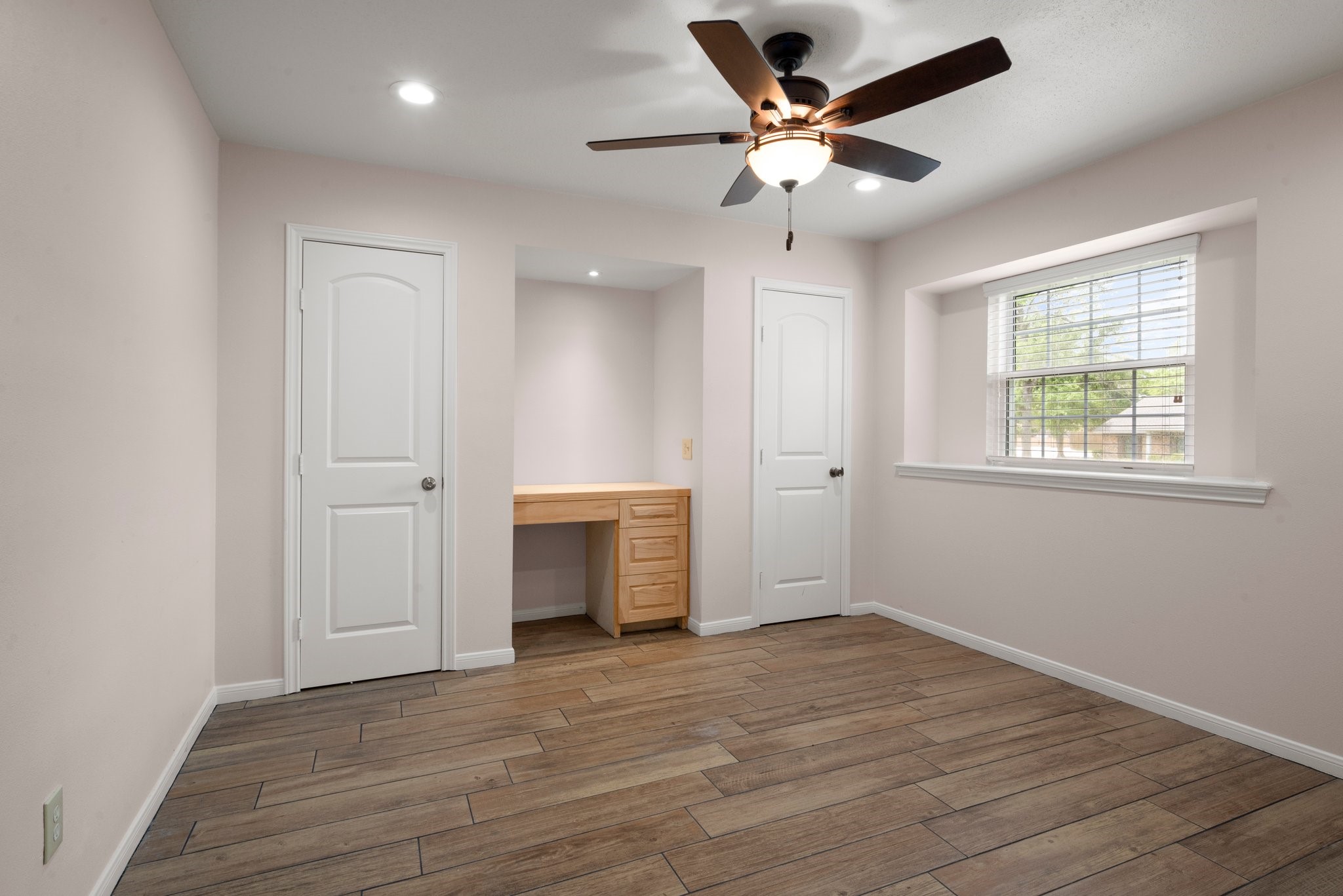 1206 Lynwood Road Spring, TX 77373 - Photo 24 of 29 wooden floor in an empty room with a window