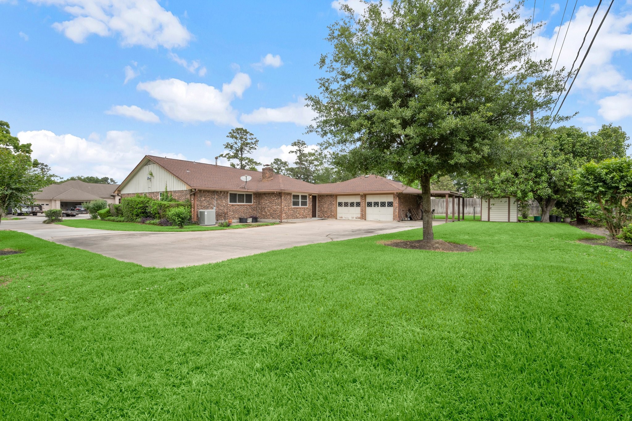 1206 Lynwood Road Spring, TX 77373 - Photo 27 of 29 a front view of house with yard and green space