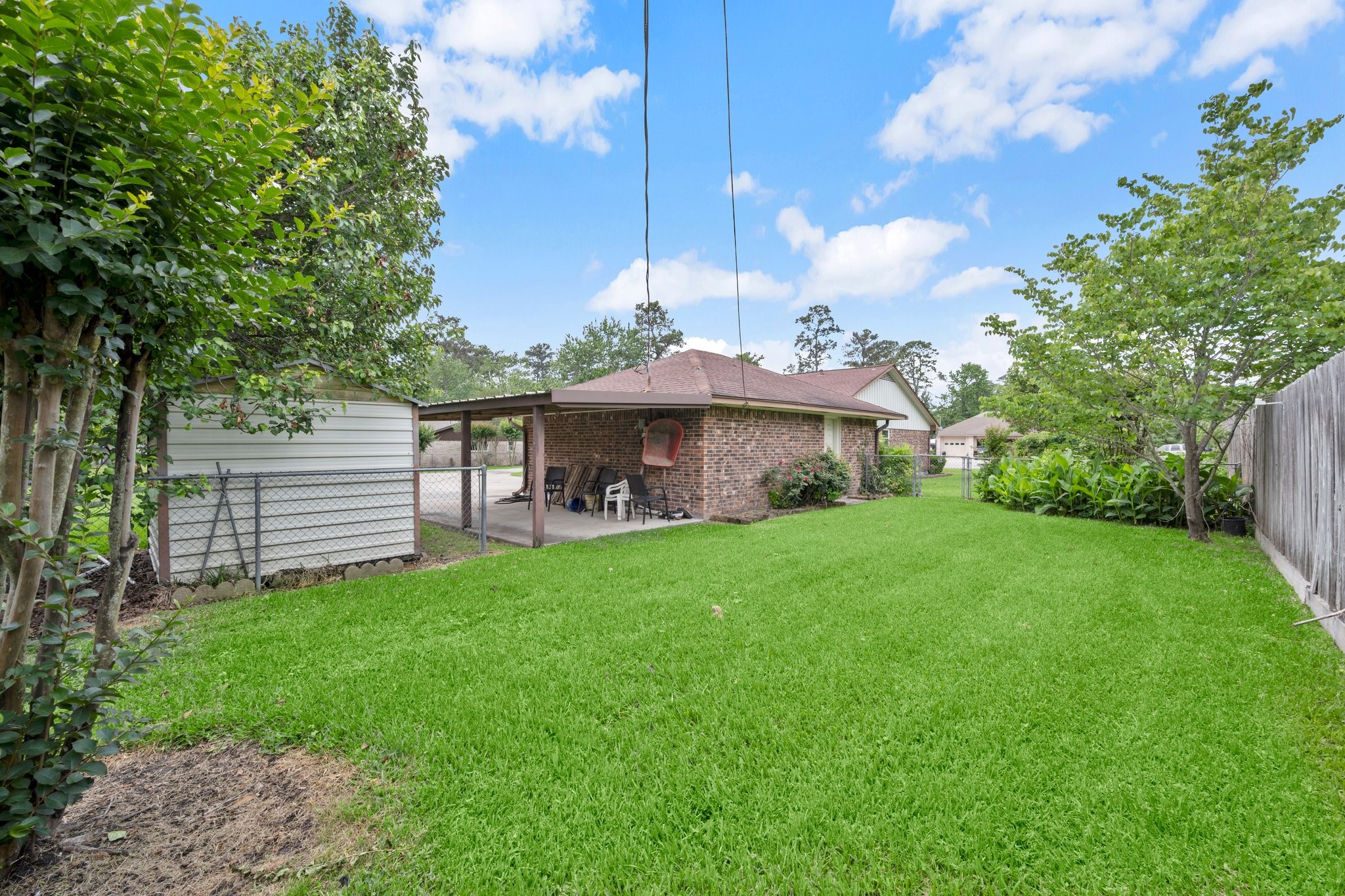 1206 Lynwood Road Spring, TX 77373 - Photo 29 of 29 a front view of a house with garden