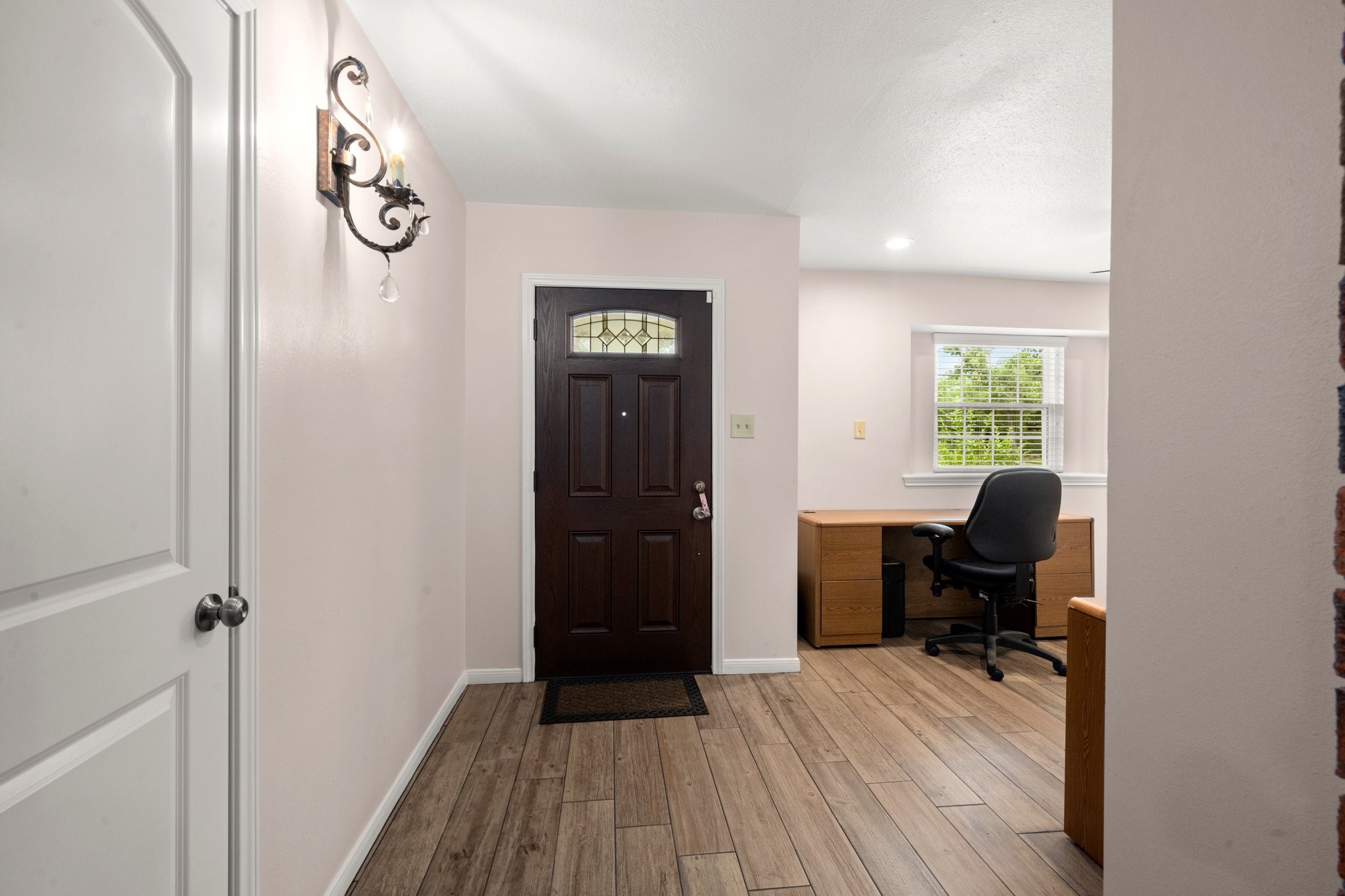 1206 Lynwood Road Spring, TX 77373 - Photo 6 of 29 a view of a workspace with furniture and a window