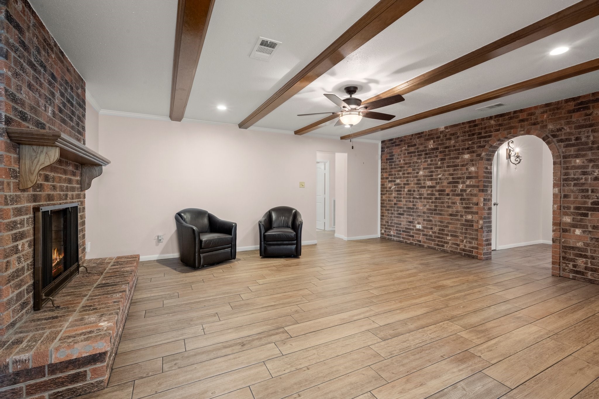 1206 Lynwood Road Spring, TX 77373 - Photo 9 of 29 a view of a livingroom with a fireplace