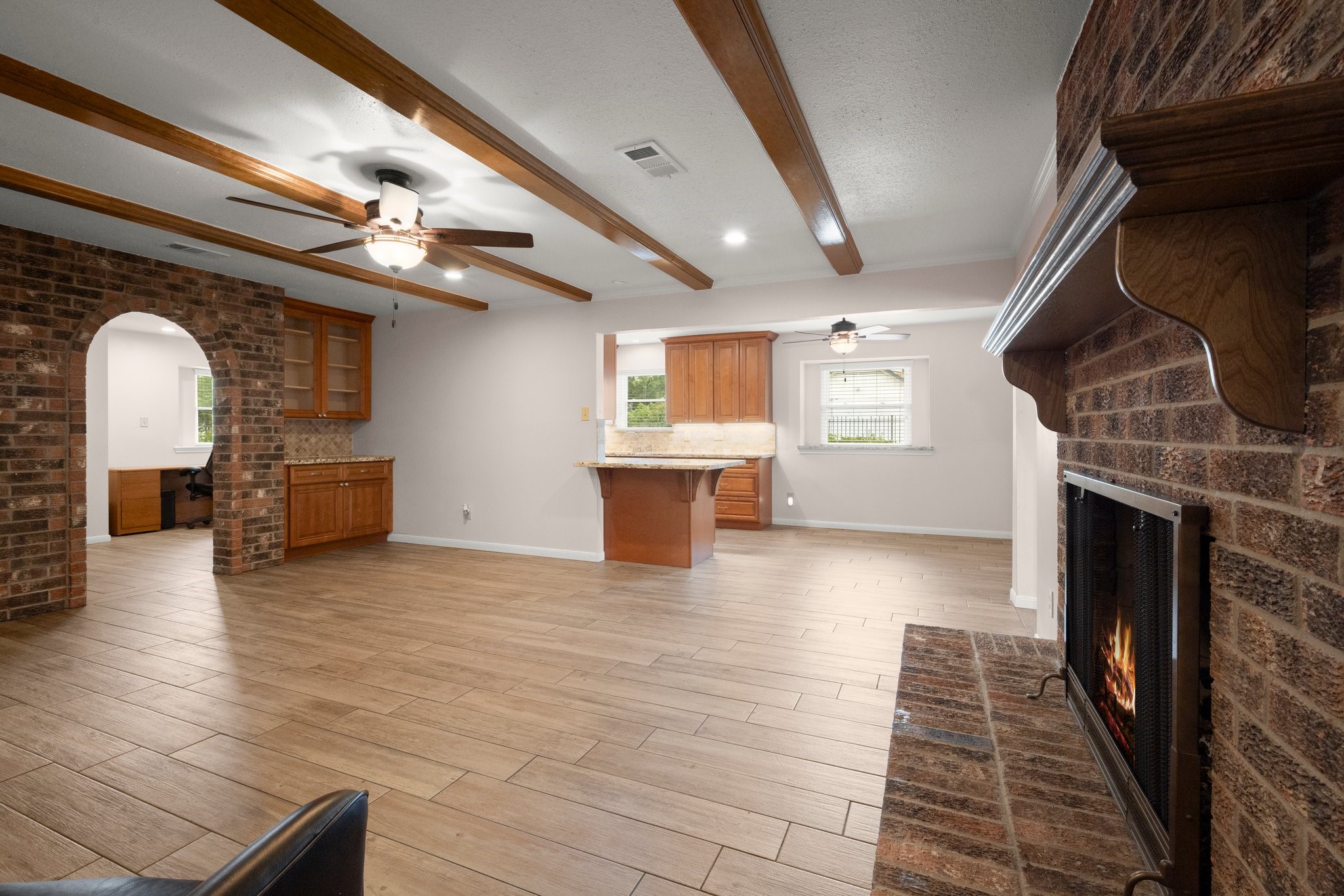 1206 Lynwood Road Spring, TX 77373 - Photo 10 of 29 a view of a kitchen with furniture and a fireplace