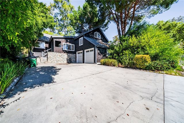 a house view with a outdoor space