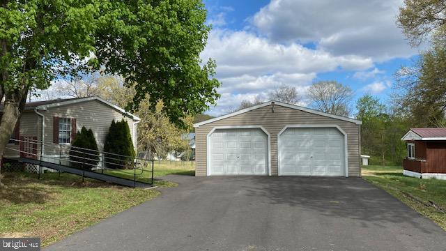 Charming home with spacious garage.