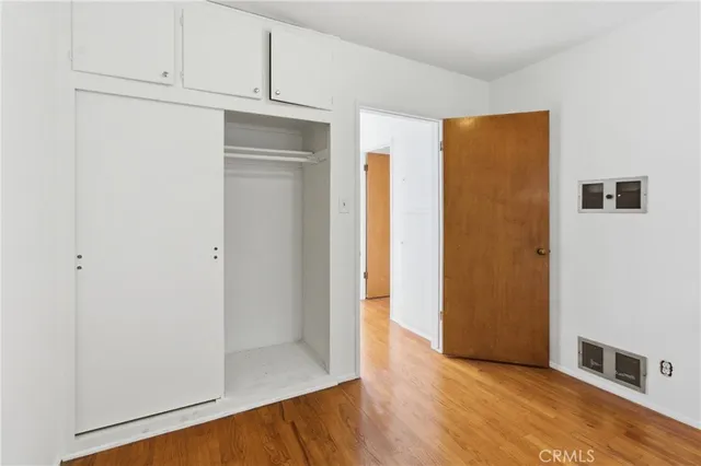 a view of a livingroom with wooden floor