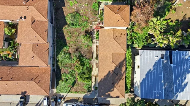 an aerial view of a house with swimming pool