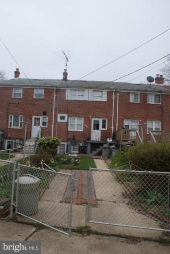 507 Brisbane Road Baltimore, MD 21229 - Photo 2 of 11 a front view of a house with a yard