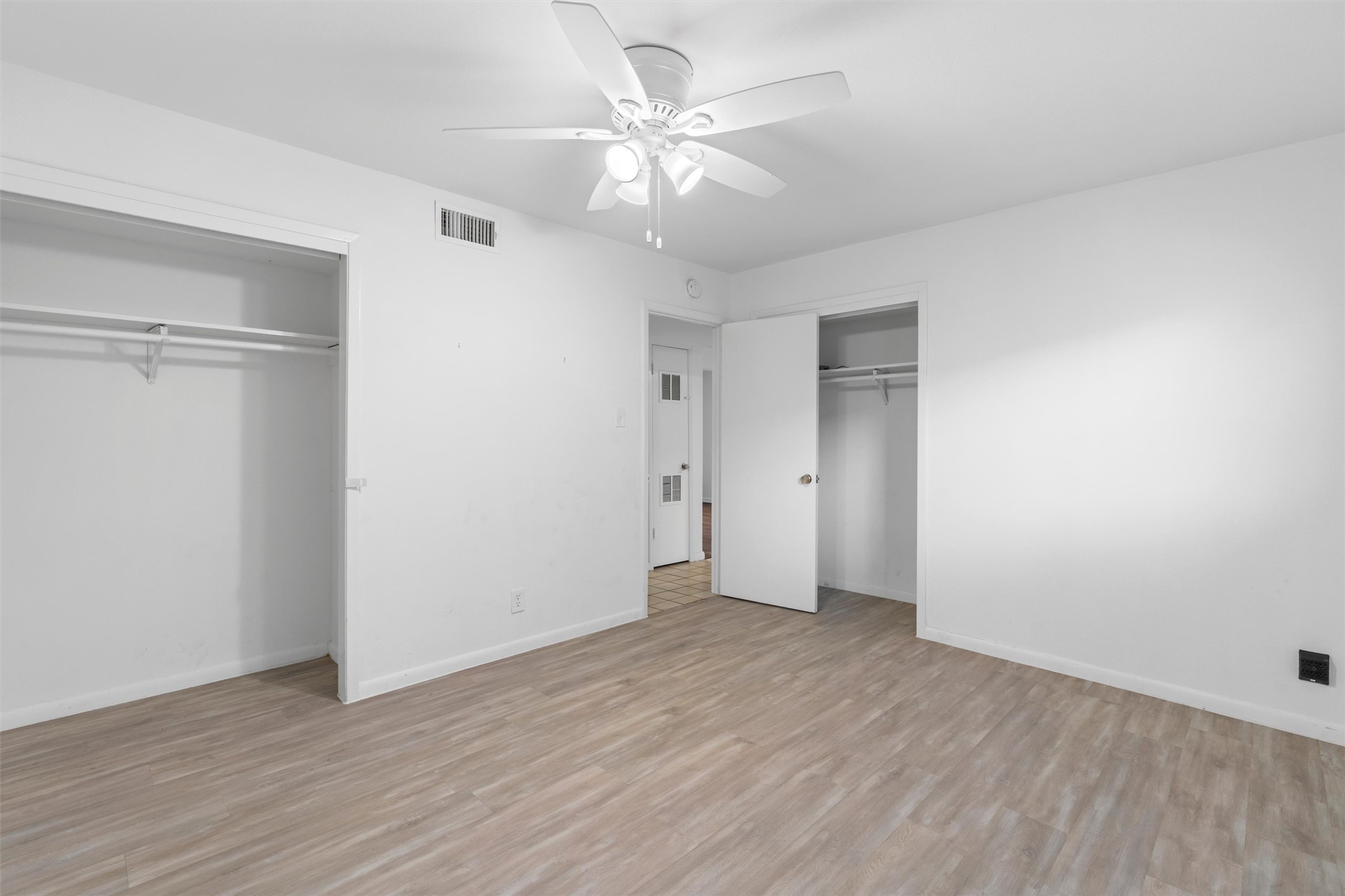 2208 Enfield Road, Unit 10500 Austin, TX 78703 - Photo 21 of 34 Bright interior space with wood-finish flooring