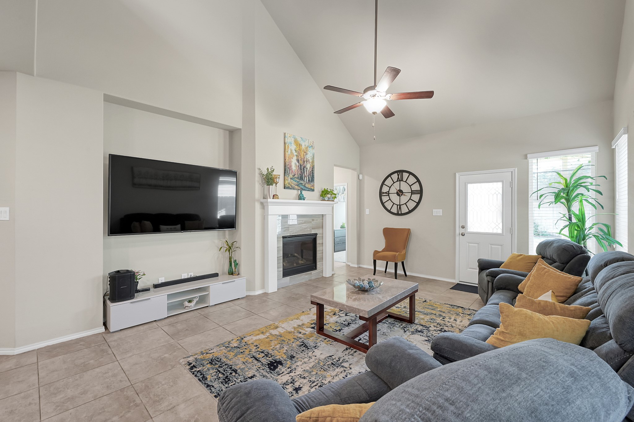 2811 Wilde Redbud Lane Conroe, TX 77385 - Photo 11 of 32 a living room with furniture and a flat screen tv