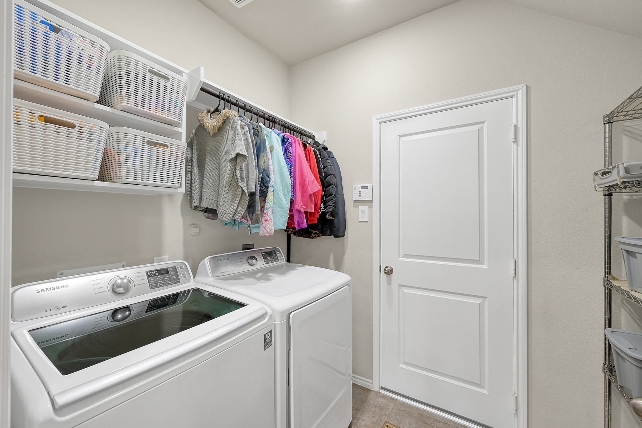 2811 Wilde Redbud Lane Conroe, TX 77385 - Photo 17 of 32 a view of storage and utility room