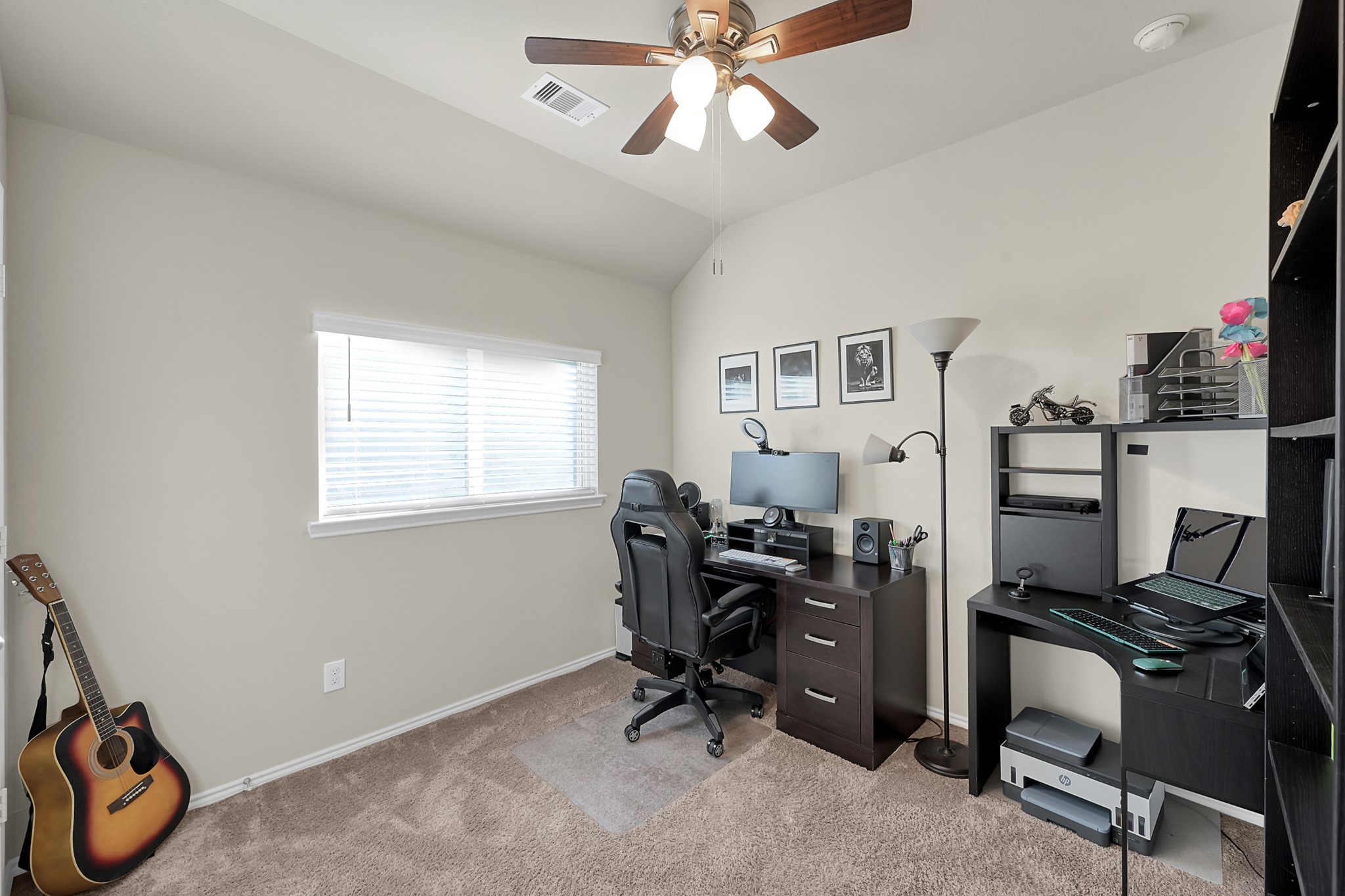 2811 Wilde Redbud Lane Conroe, TX 77385 - Photo 21 of 32 a view of a workspace with furniture and a window