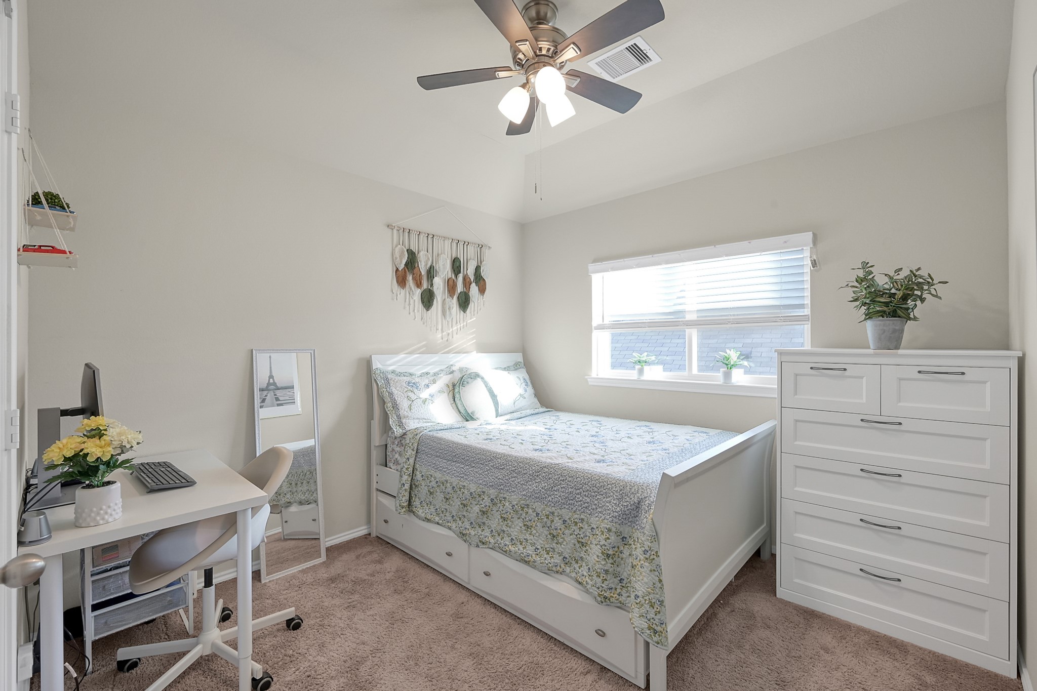 2811 Wilde Redbud Lane Conroe, TX 77385 - Photo 22 of 32 a bedroom with a bed and a window