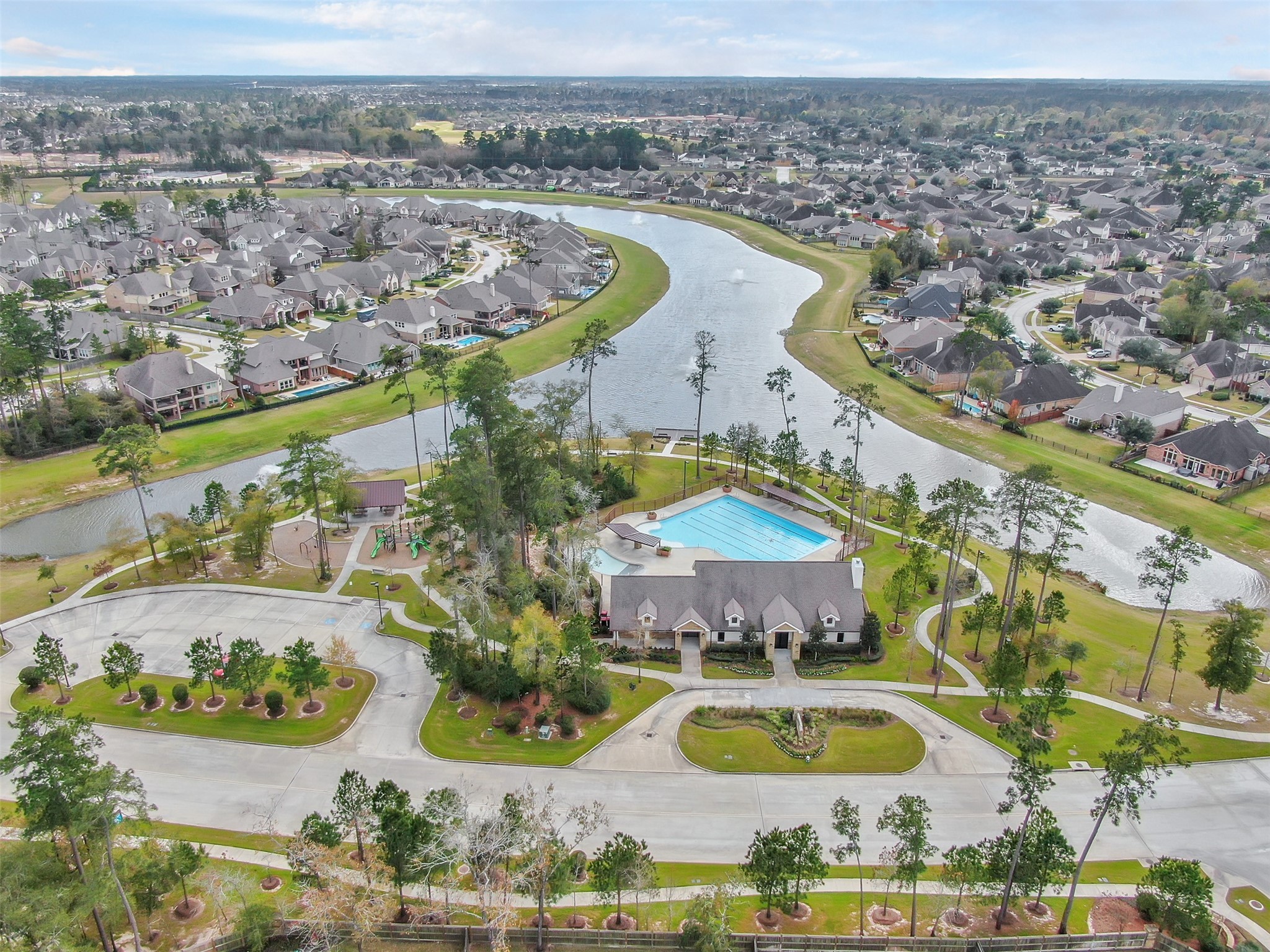 2811 Wilde Redbud Lane Conroe, TX 77385 - Photo 26 of 32 an aerial view of a house with a swimming pool