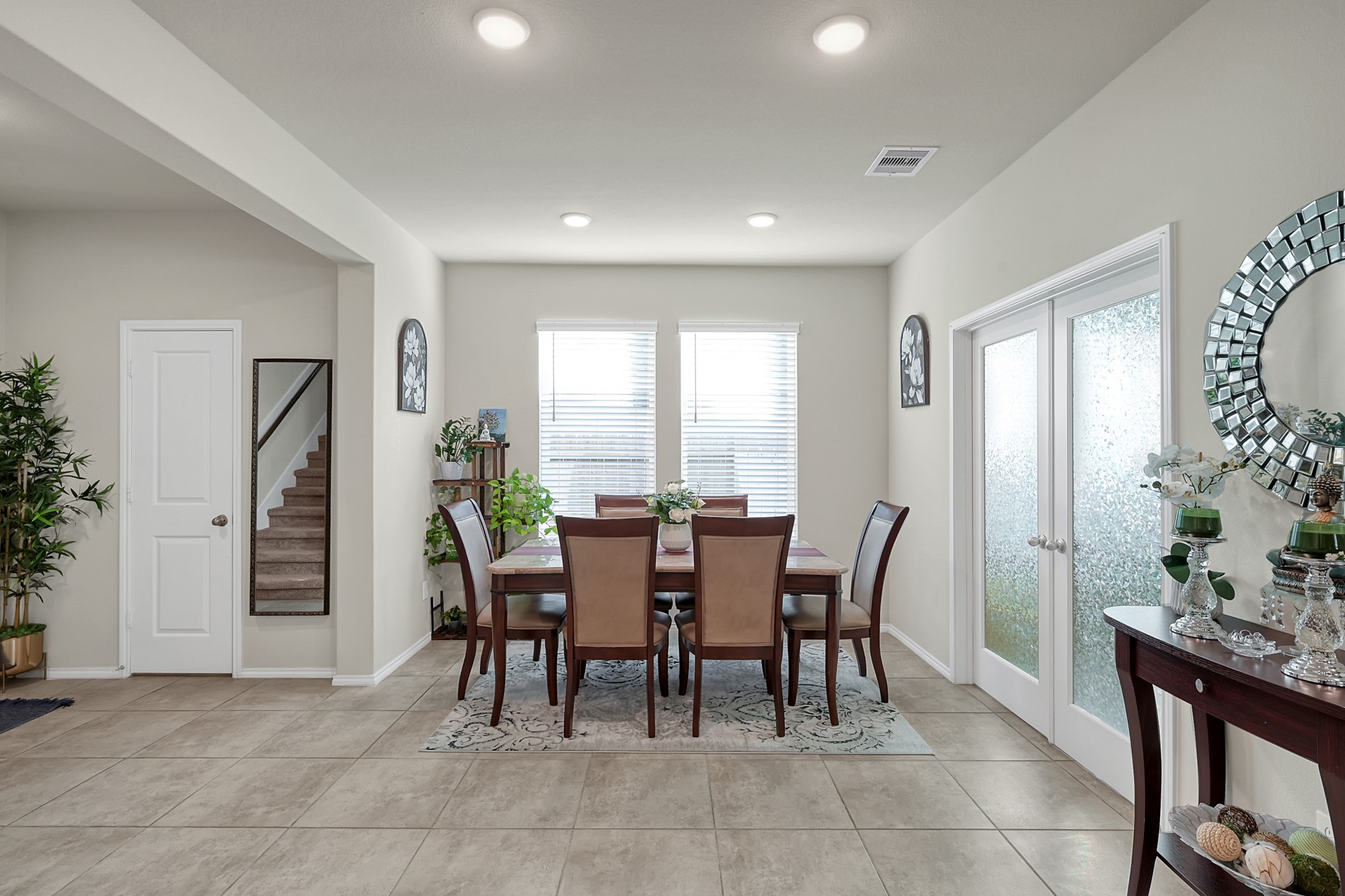 2811 Wilde Redbud Lane Conroe, TX 77385 - Photo 6 of 32 a view of a dining room with furniture