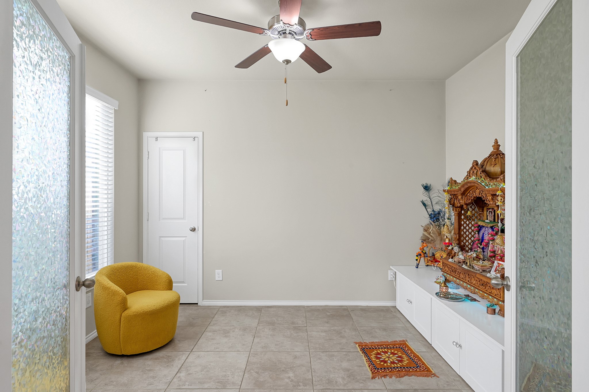2811 Wilde Redbud Lane Conroe, TX 77385 - Photo 7 of 32 wooden floor in a room with a window and a chandelier
