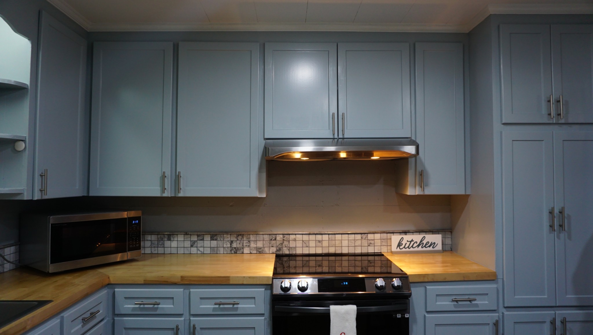 5323 Lanes Ferry Road Newbern, TN 38059 - Photo 12 of 31 a kitchen with a stove and a microwave