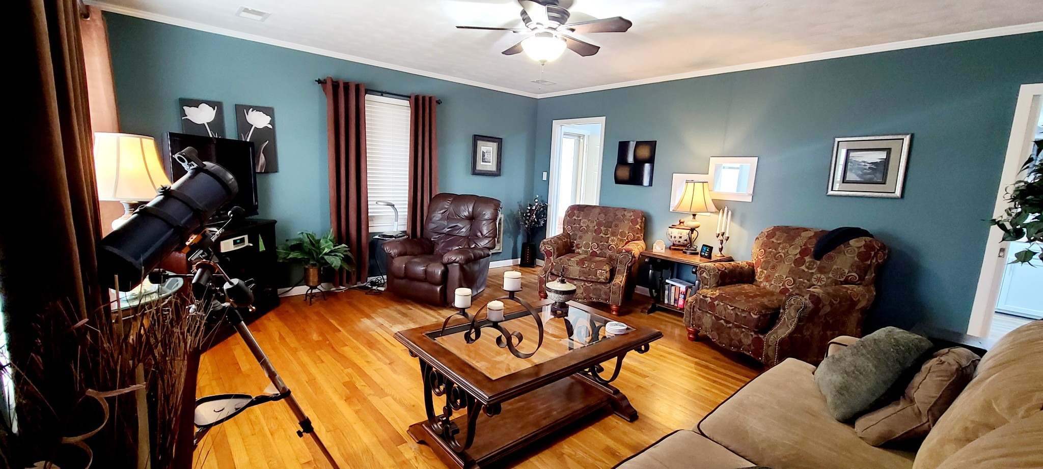 5323 Lanes Ferry Road Newbern, TN 38059 - Photo 22 of 31 a living room with furniture and a chandelier