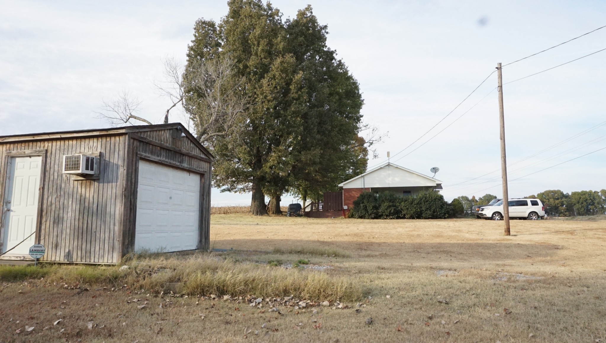 5323 Lanes Ferry Road Newbern, TN 38059 - Photo 5 of 31 a front view of a house with a yard
