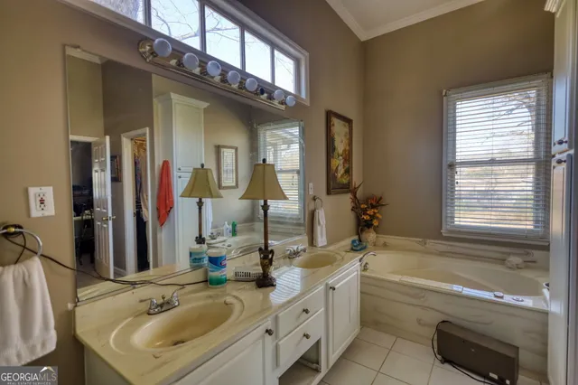 a living room with furniture a rug and a fireplace