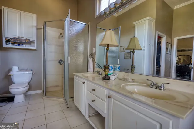a living room with furniture a clock and a window