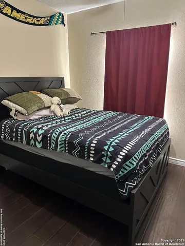 a bedroom with a bed