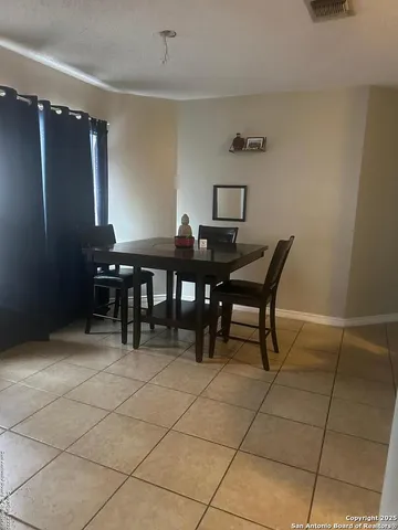 a view of a workspace with furniture