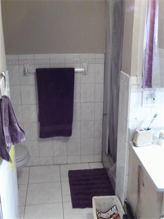 275 Andover Road Billerica, MA 01821 - Photo 15 of 26 a bathroom with a sink and a mirror