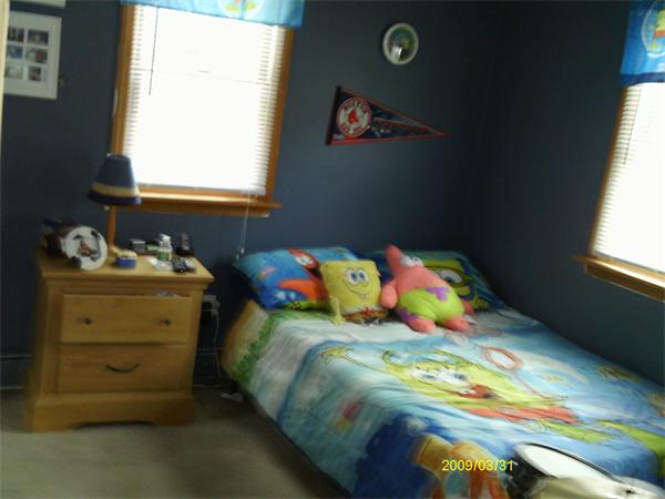 275 Andover Road Billerica, MA 01821 - Photo 19 of 26 a bedroom with a bed and a window